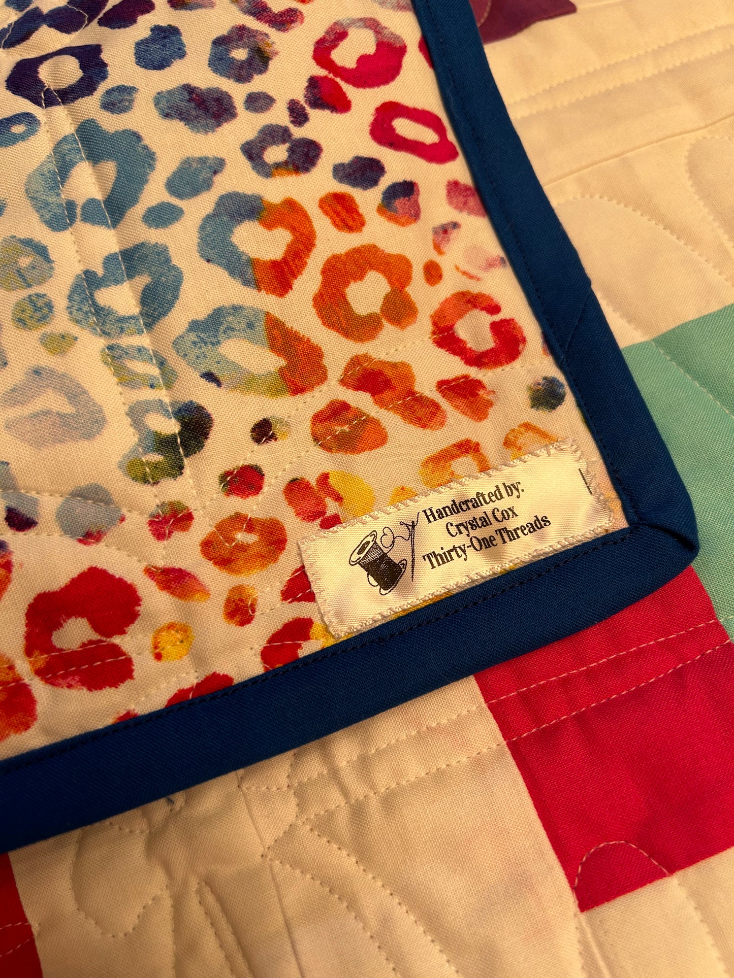 Custom reversible full/queen sized quilt